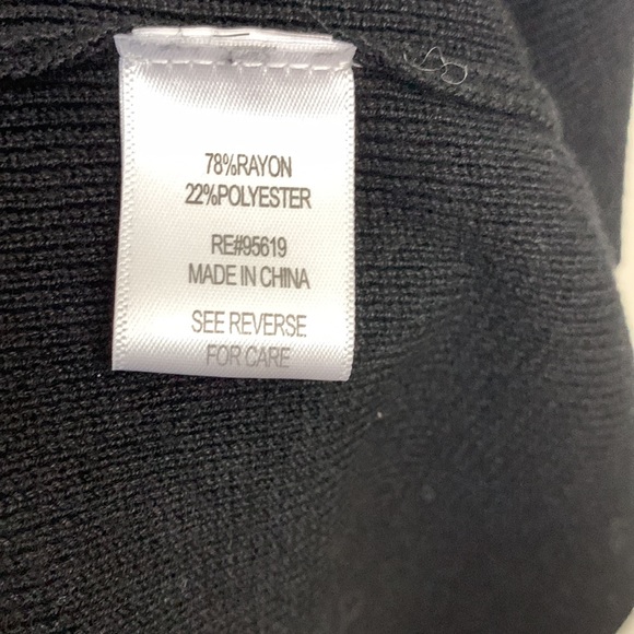 Black V neck Fever sweater with flaired sleeves and around hips. - Picture 5 of 8